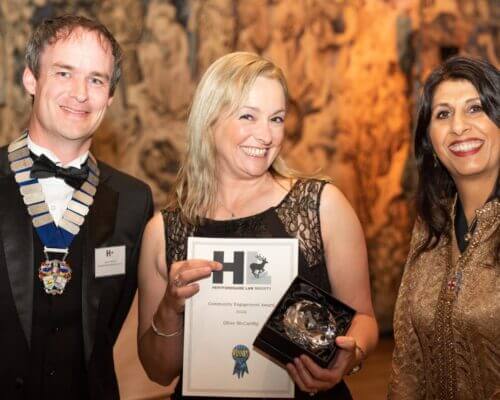 Picture of Olive McCarthy and her Community Engagement Award at the Hertfordshire Law Society Dinner in 2022