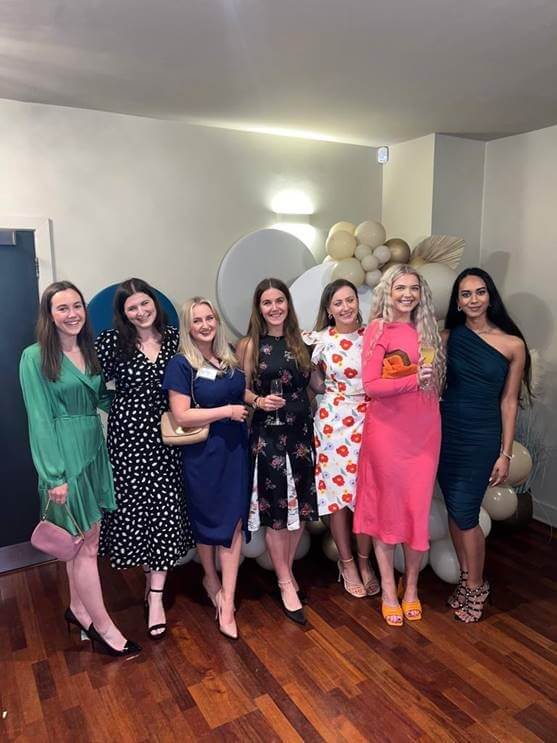Seven well-dressed women