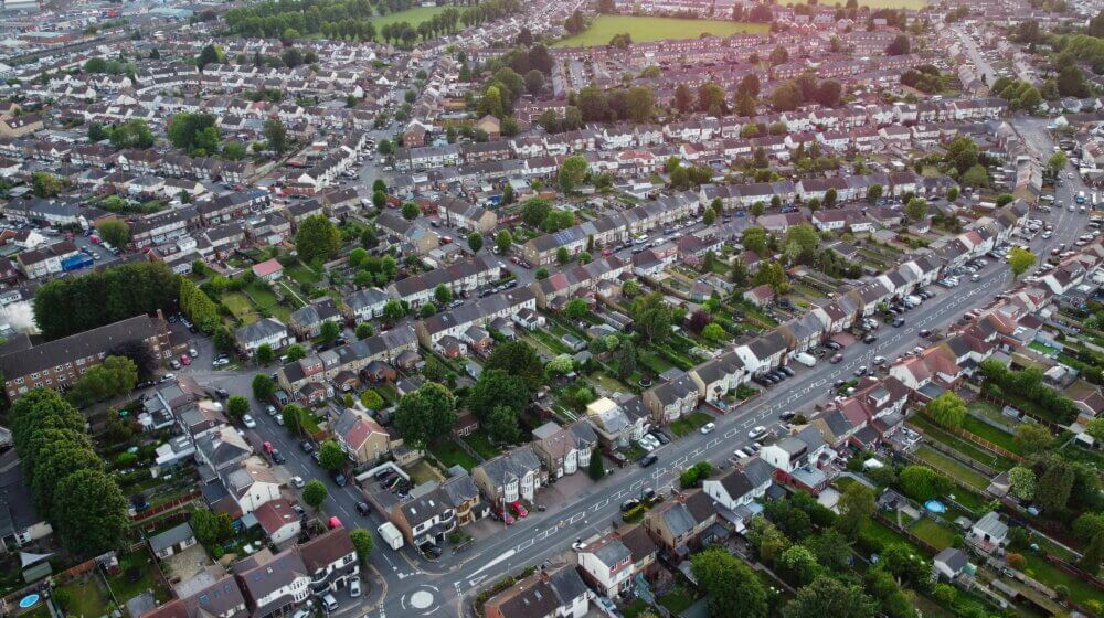 Picture of a residential street full of houses and roads to reflect the theme of joint tenants and tenants in common.