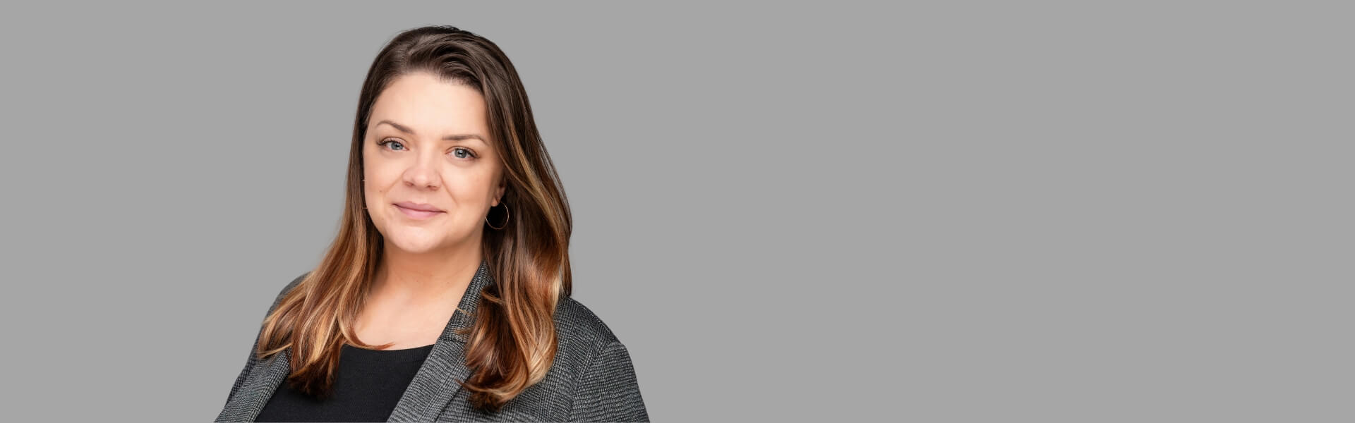 Headshot of Emily Faulkner, People & Talent Executive