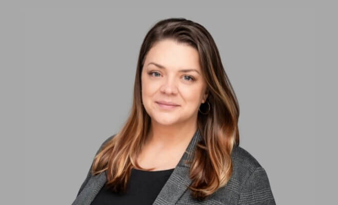 Headshot of Emily Faulkner, People & Talent Executive